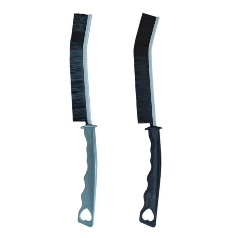 Two black-bristled gap cleaning brushes with ergonomic gray and black handles designed for tile and crevice cleaning in a 5 piece set.