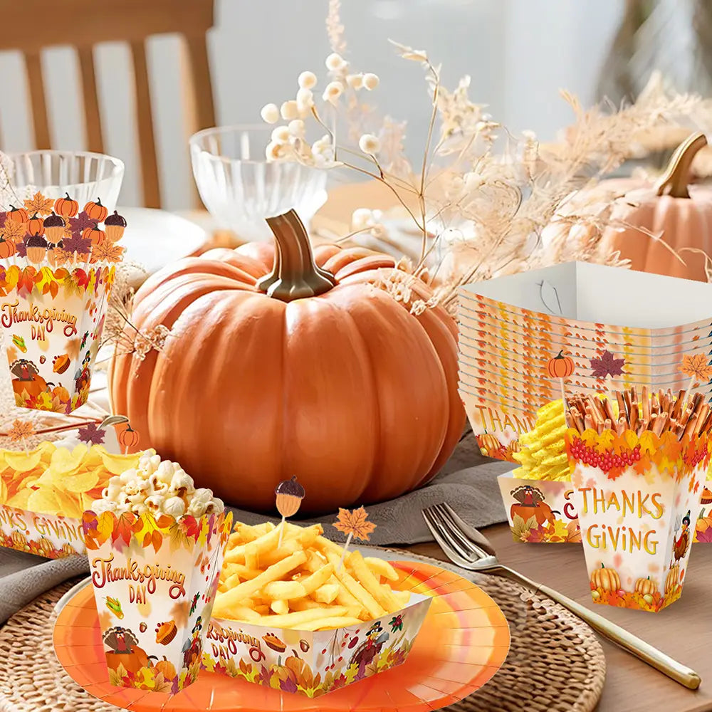 Orange paper Thanksgiving pumpkin paper plates and tableware set featuring festive pumpkin and autumn leaf designs for seasonal dining.