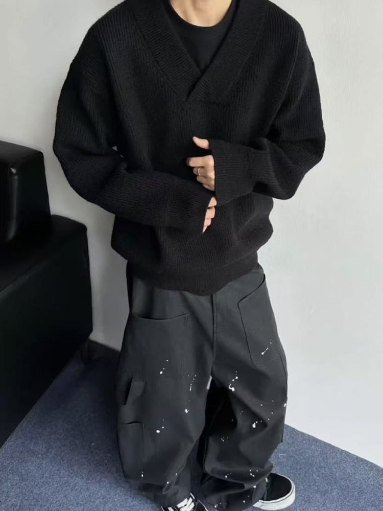 black ribbed knit v-neck pullover sweater with long sleeves and a relaxed fit for comfortable casual wear