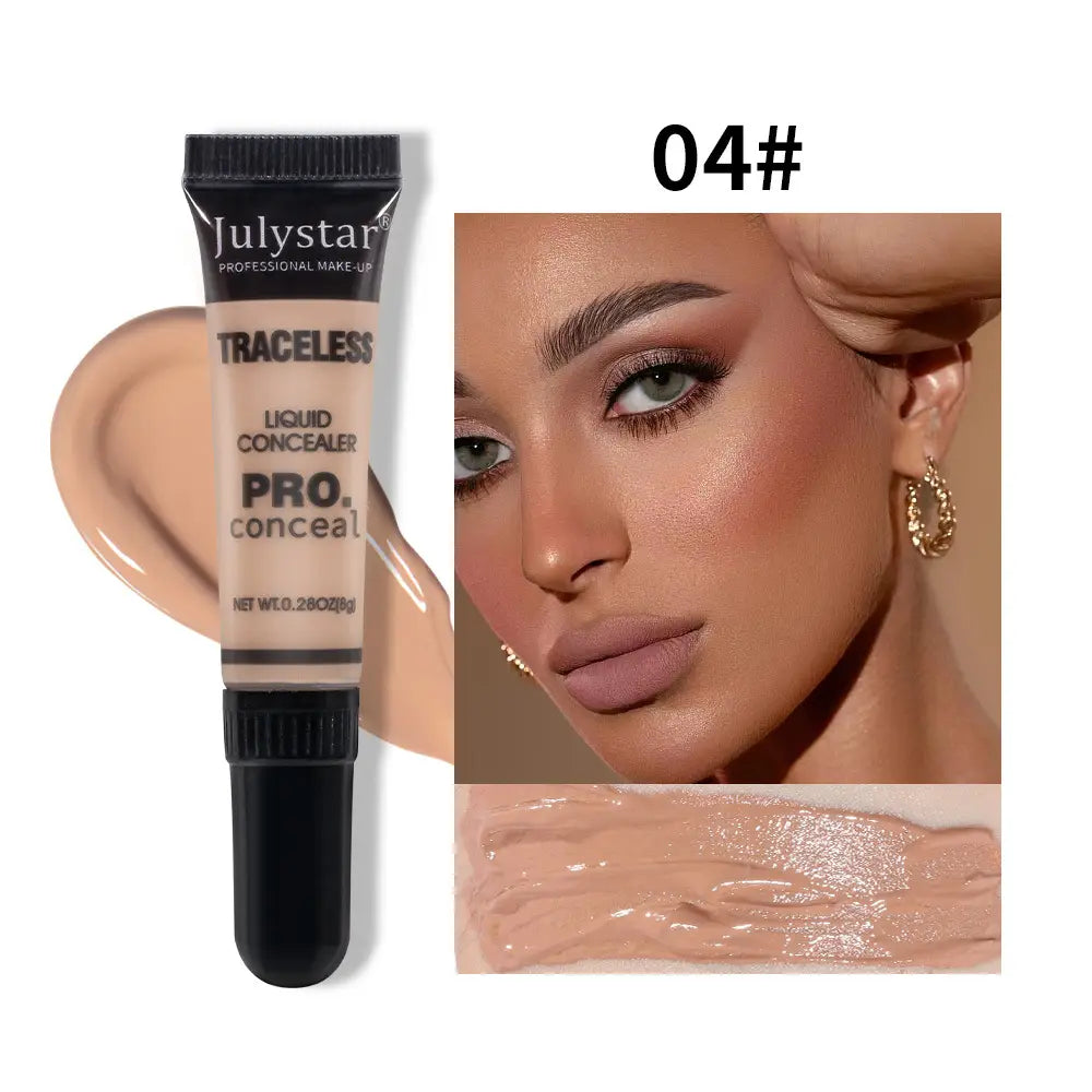 Julystar traceless pro tattoo concealer in shade 04# features a sleek black tube containing beige liquid makeup for seamless coverage.