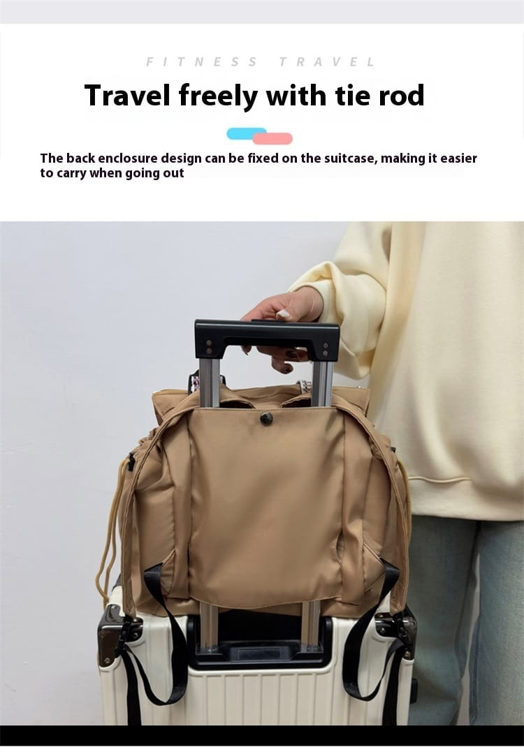 Beige multifunctional waterproof nylon fashion tote and backpack with black metal handle and straps designed to attach securely to a suitcase for convenient travel.