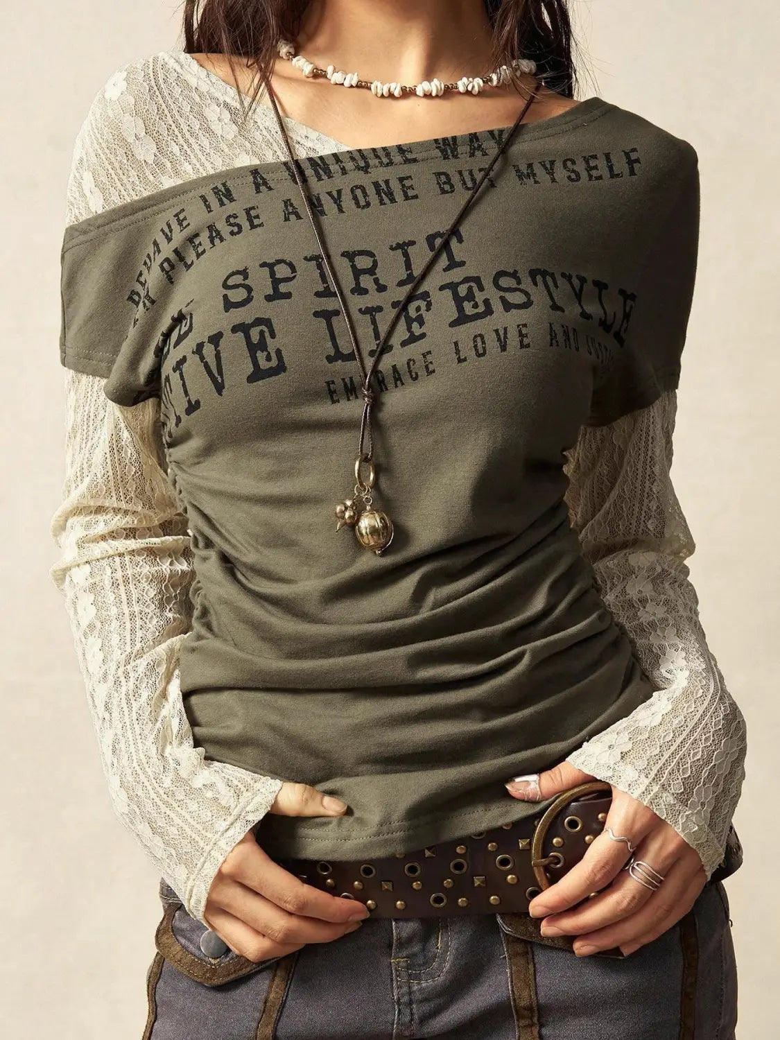 olive green lace layer off shoulder knitted top with black printed text and lace long sleeves