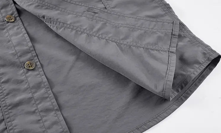 Men solid workwear shirt short sleeve in gray with subtle texture and metallic buttons suitable for professional use