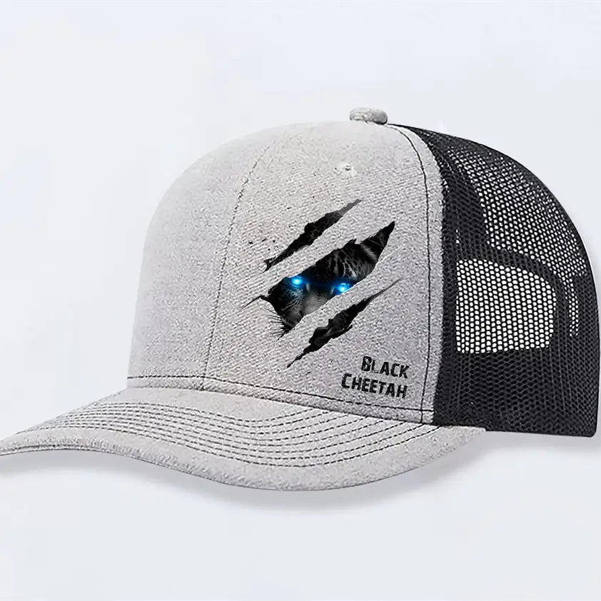 Gray and black polyester trucker hat for men featuring glowing blue eyes peeking through torn fabric and black cheetah printed below.