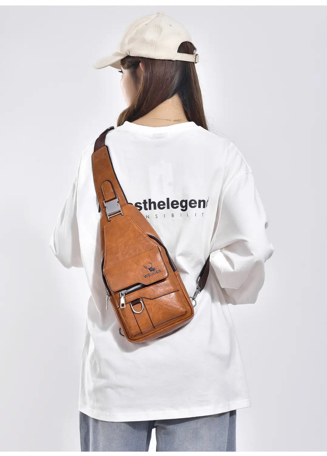 Men’s retro waterproof faux leather crossbody chest bag in tan leather with a front zipper pocket and adjustable strap.