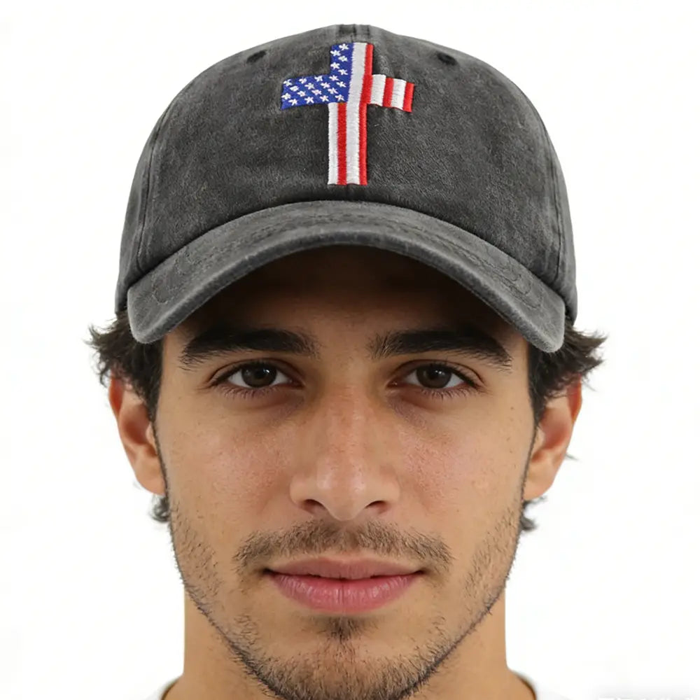 Dark gray distressed baseball cap made of cotton featuring an embroidered American flag cross on the front ideal for casual wear.