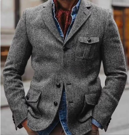 Men herringbone slim fit suit jacket in gray wool with black buttons and flap pockets.