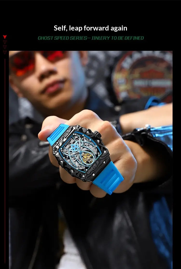 Men’s barrel skeleton automatic mechanical sport watch with a blue rubber strap black skeletonized case and intricate blue gearwork visible through the transparent dial.
