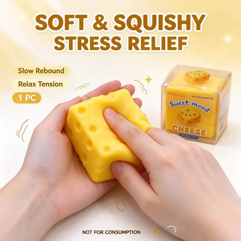 Yellow cheese-shaped slow rising squeeze toy with holes and squishy texture viewed from the front