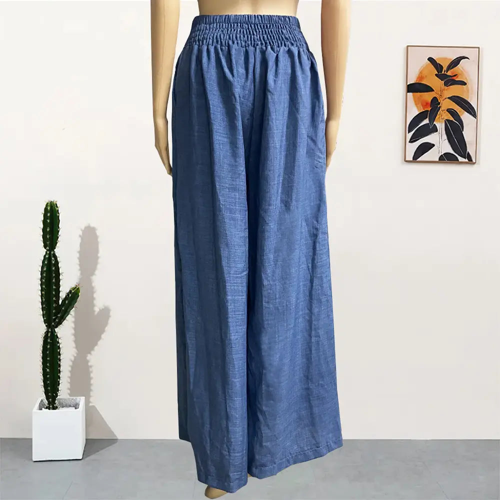 pantalon en lin bleu à jambes larges pour femmes avec une ceinture élastique, adapté à une tenue décontractée au bureau