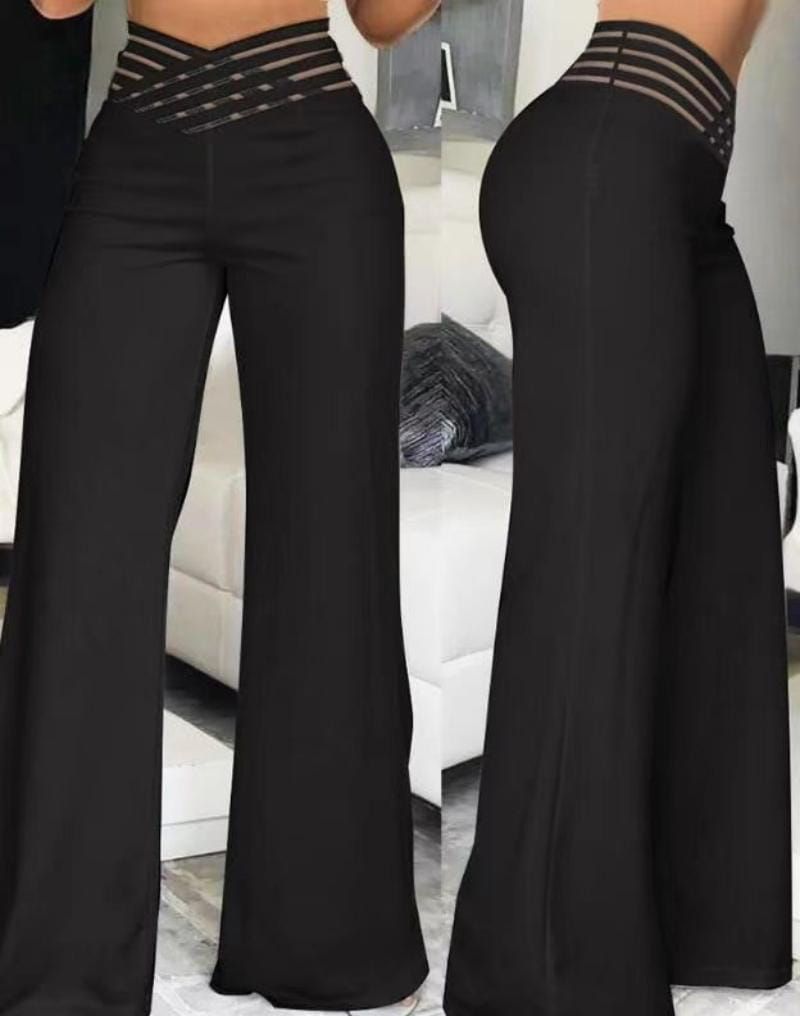 Pantalon noir taille haute à jambes larges avec une ceinture élastique à rayures, adapté à une tenue décontractée au bureau
