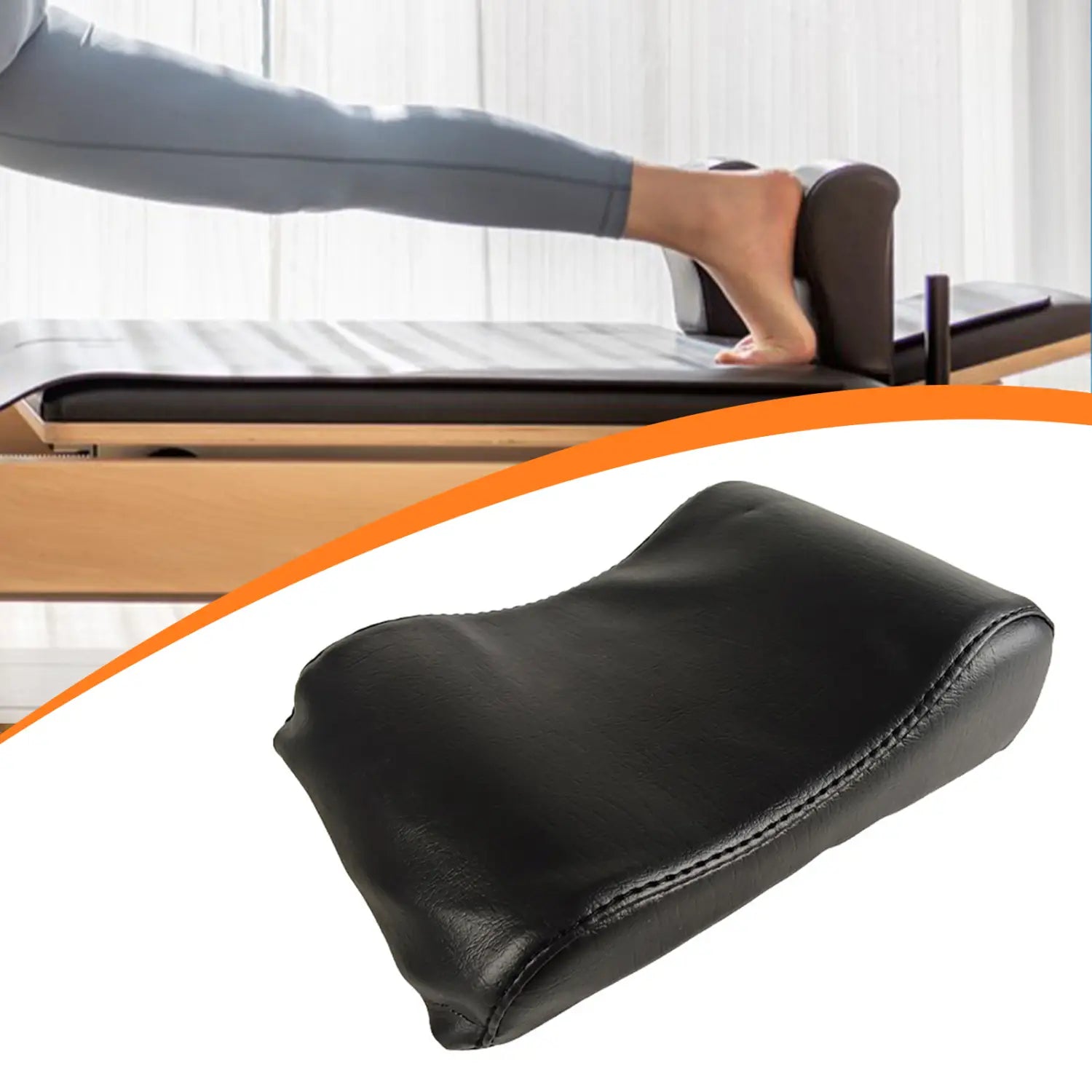 Black leather neck support pillow for Pilates reformer with stitched edges and a foot rest design.