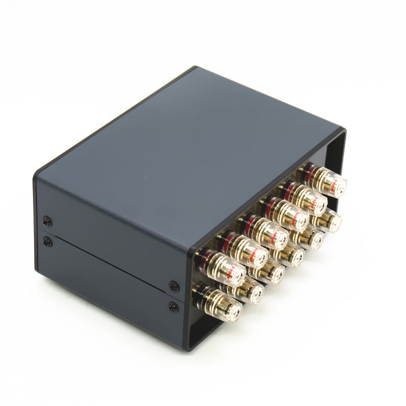 Black rectangular hifi audio switcher 2 way speaker selector box with eight gold-plated binding posts shown from the back side