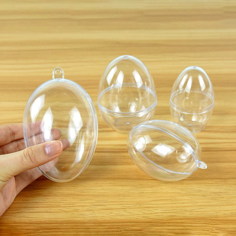 clear plastic easter egg ornaments made of glitter foam with a small loop at the top for hanging suitable for diy party decor