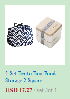 the image shows two bento boxes with one covered in navy blue and white patterned fabric and the other in plain off-white plastic alongside a wedding champagne flutes gold heart toasting glasses set.