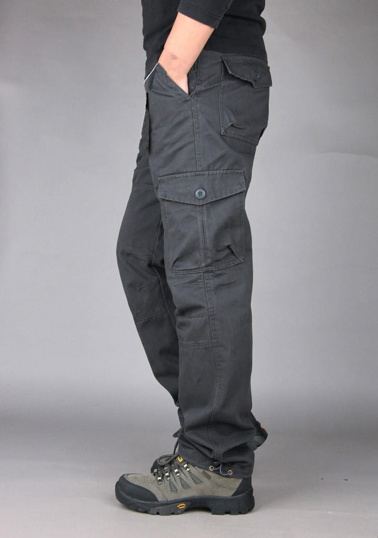 men tactical cargo pants in dark gray cotton featuring multiple pockets and a buttoned flap on the thigh for work and outdoor use