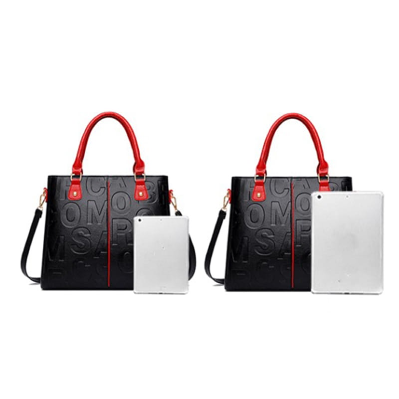 Black crossbody handbag pu leather satchel style1 style2 featuring red handles bold embossed letter design and contrasting red zipper pulls.