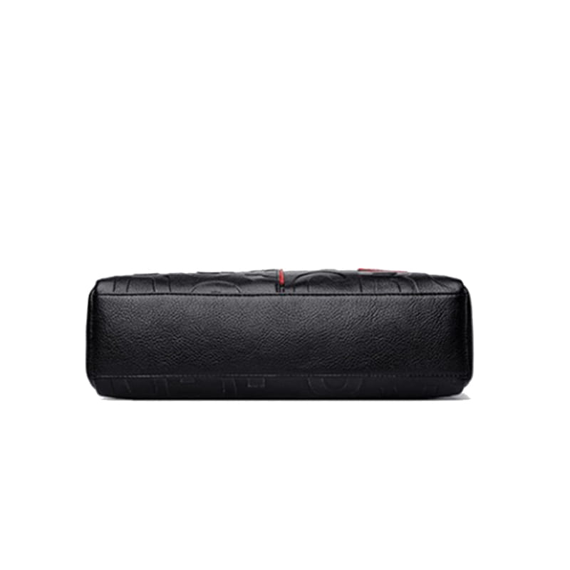 black crossbody handbag pu leather satchel style1 style2 featuring black textured leather with subtle embossed patterns and a small red accent detail