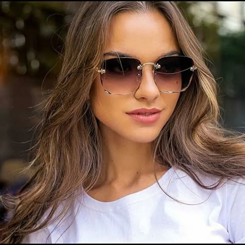 Silver-framed square gradient sunglasses for women featuring dark lenses and decorative metal accents in brown and gold.