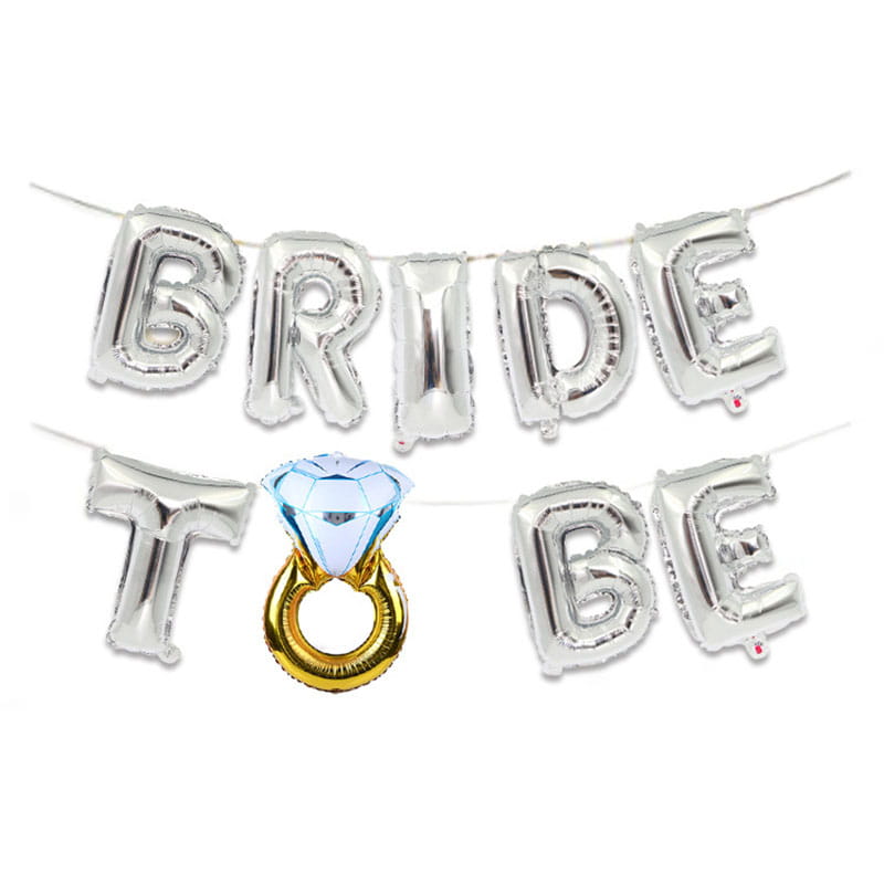 Bride to be foil balloon banner set featuring silver and gold foil balloons spelling bride to be with a central diamond ring design for bridal celebrations.