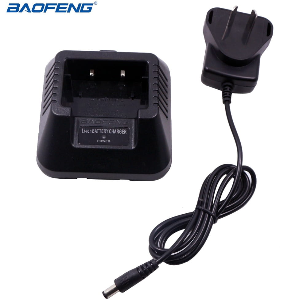 Black baofeng uv-5r li-ion battery charger with coiled power cord and uk-style plug for efficient charging of uv5r radios.