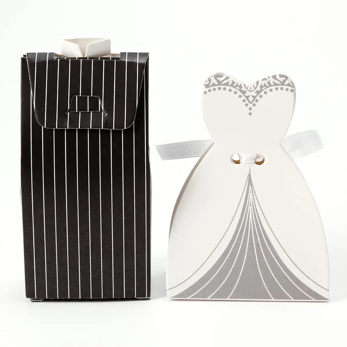 white paper wedding dress-shaped favor box with silver decorative details and a satin ribbon from bride and groom wedding favor candy boxes 30 pcs collection