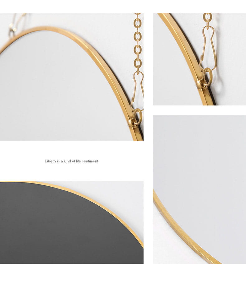 Gold-toned oval wall hanging mirror with a sleek metallic frame and hanging chain for decorative use.