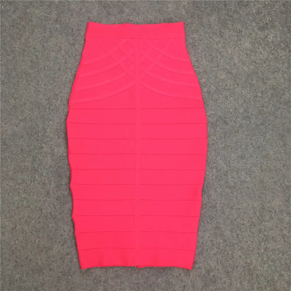 Jupe midi bandeau pour femme en maille côtelée rose vif : design crayon taille haute, ajusté, avec une silhouette structurée.