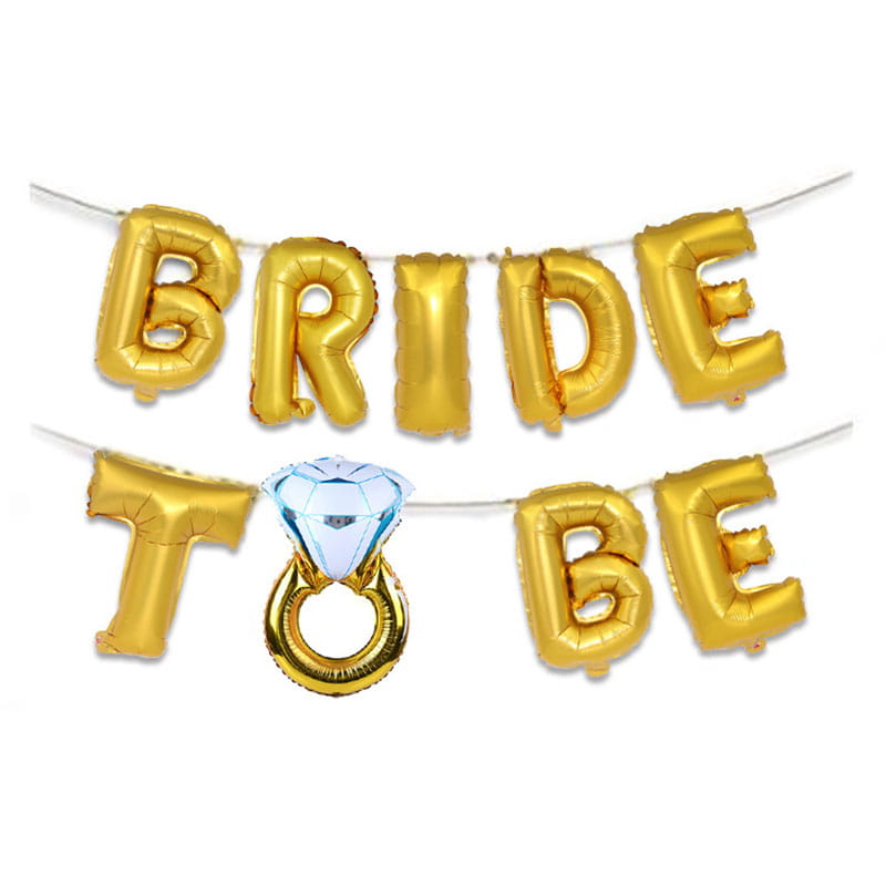 Gold foil bride to be foil balloon banner set featuring a diamond ring shaped balloon in the center for bridal celebrations.