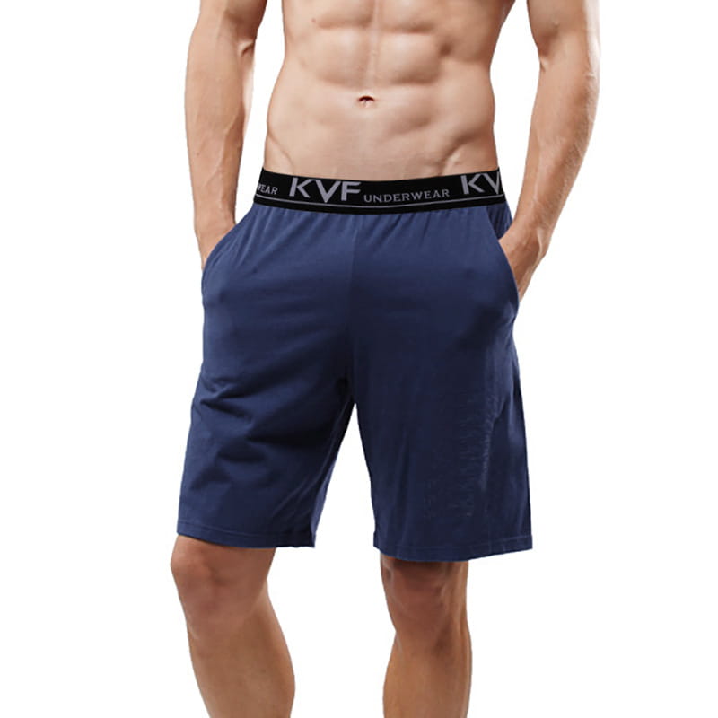 Navy blue kvf cotton boxer shorts with a black elastic waistband featuring white lettering designed for loose casual lounge gym jogging wear.