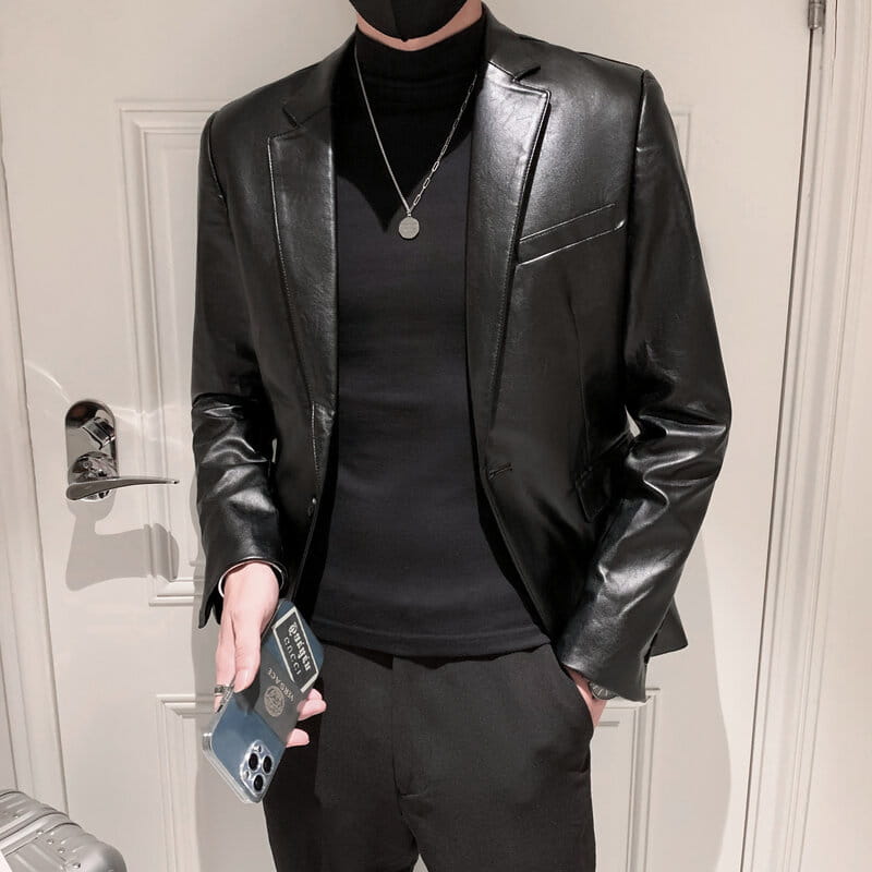 Black leather blazer showcasing slim fit design and full sleeve length suitable for men’s suit coats.