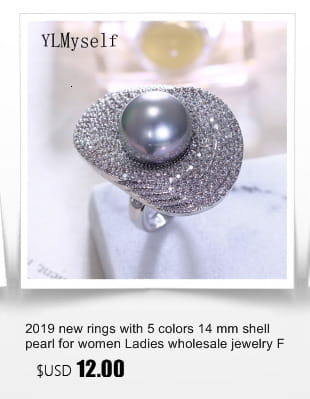 Black and white crystal statement flower ring in silver tone featuring a central 14mm shell pearl surrounded by pave-set stones and an elegant teardrop-shaped band.