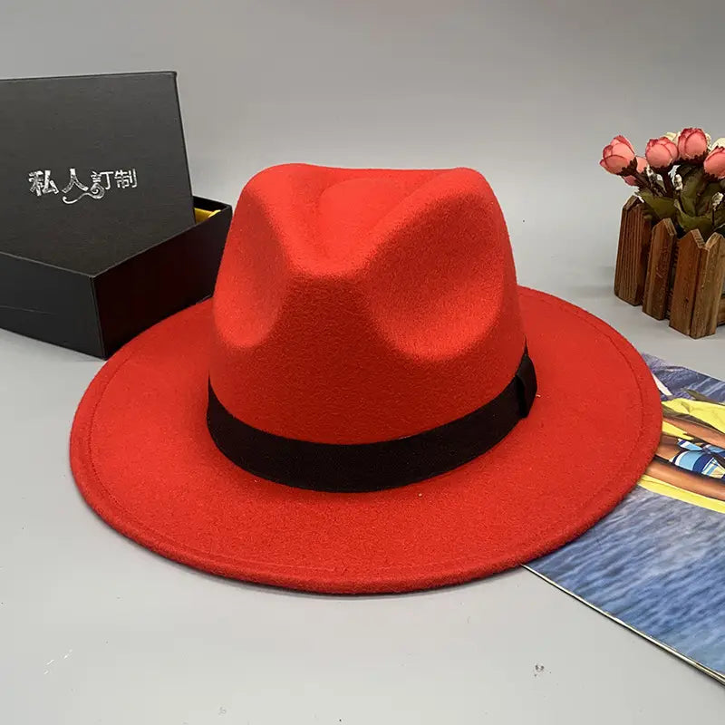 vibrant red unisex woolen felt fedora hat with sleek black band and feather accent