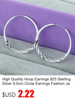 Sterling silver zircon flower hoop earrings featuring textured diamond-cut silver hoops.