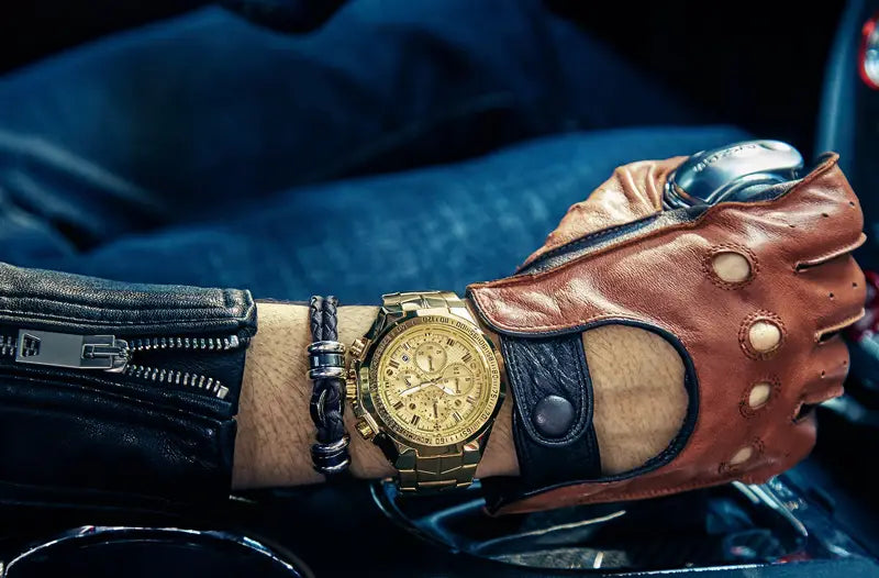 Gold-tone chronograph watch for men with detailed dial and stainless steel metallic bracelet worn on a wrist showcasing luxury timepiece design.