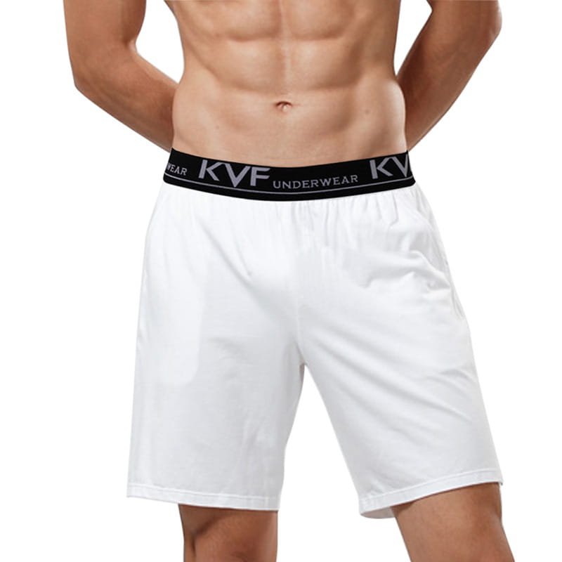 White men cotton boxer shorts with a black elastic waistband featuring the kvf underwear logo in white lettering for casual lounge gym and jogging use.