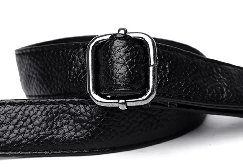 Black crossbody handbag style1 style2 featuring a black textured leather belt with a silver-toned rectangular buckle on pu leather satchel style1 style2.
