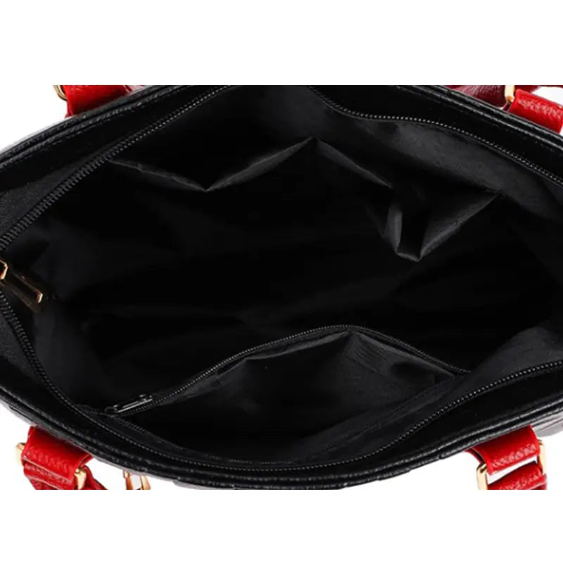 Red and black crossbody handbag with textured leather straps and gold tone hardware in style1 style2 satchel pu leather design.