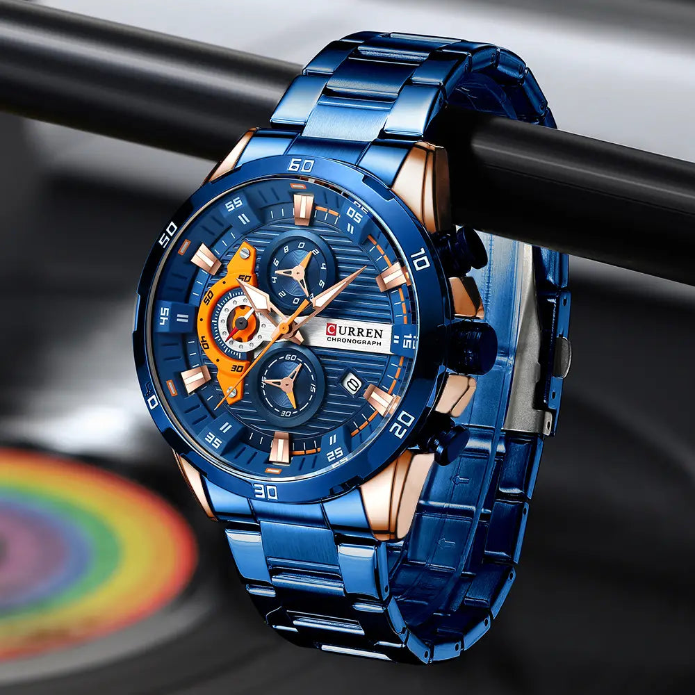 Curren men black green chronograph stainless steel watch with a blue and rose gold multi-dial face.