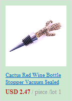 This is a castanet red wine bottle stopper vacuum sealer with an ornate gold-toned metal design featuring intricate leaf patterns and a sleek black rubber seal, complementing the wedding champagne flutes gold heart toasting glasses set.