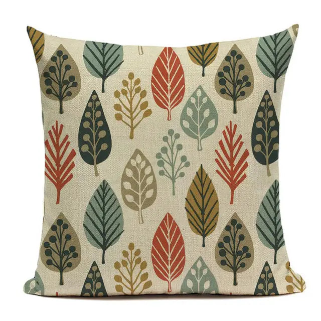 Beige cushion cover 45x45cm made of floral faux linen with a pattern of stylized leaves in shades of red green olive and brown for sofa use.