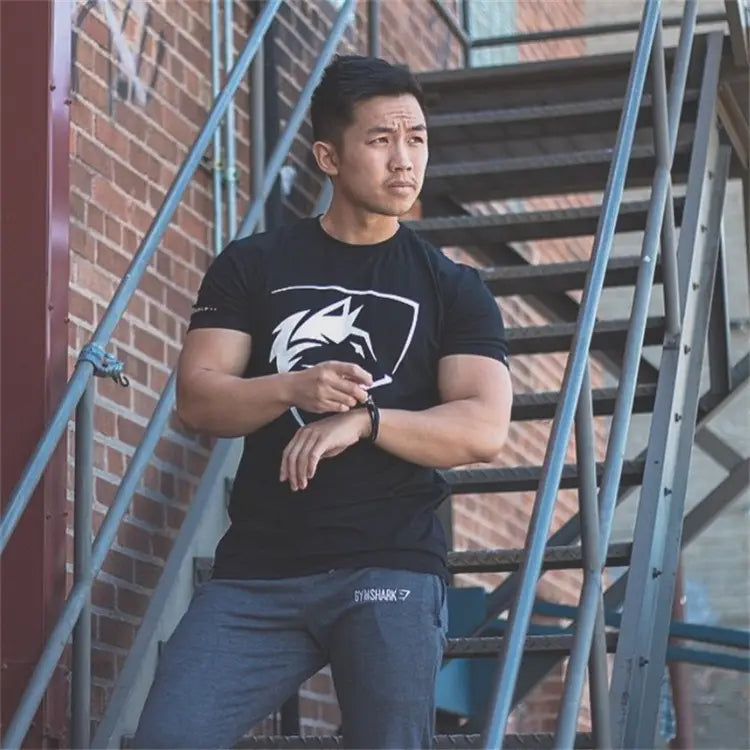 T-shirt d’entraînement gothique pour homme Gymshark en coton, avec logo de loup blanc, idéal pour le streetwear et l’exercice.