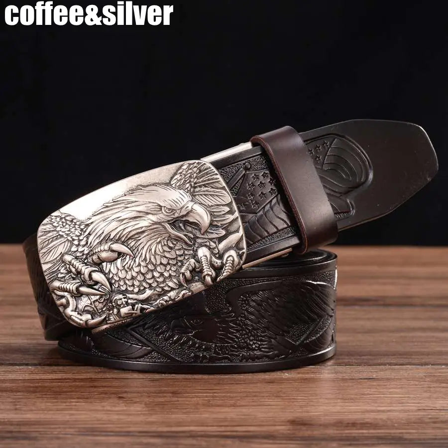 Men’s leather ratchet belt with a silver eagle buckle and dark brown leather strap featuring an embossed eagle design.