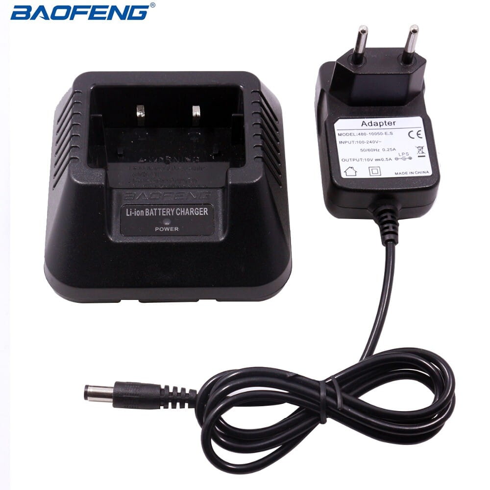 Black baofeng uv-5r li-ion battery charger with matching power adapter and coiled cable for uv5r radios.