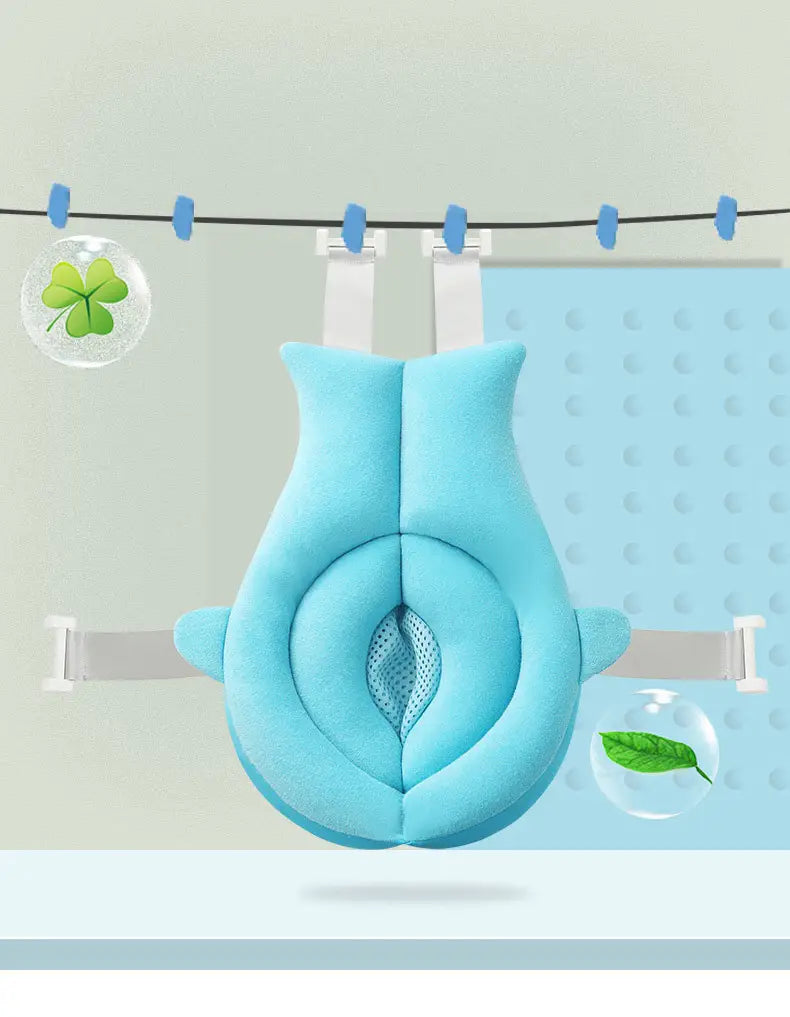Light blue plush foldable newborn bath mat and cushion with a central mesh panel and adjustable straps for baby bath support.