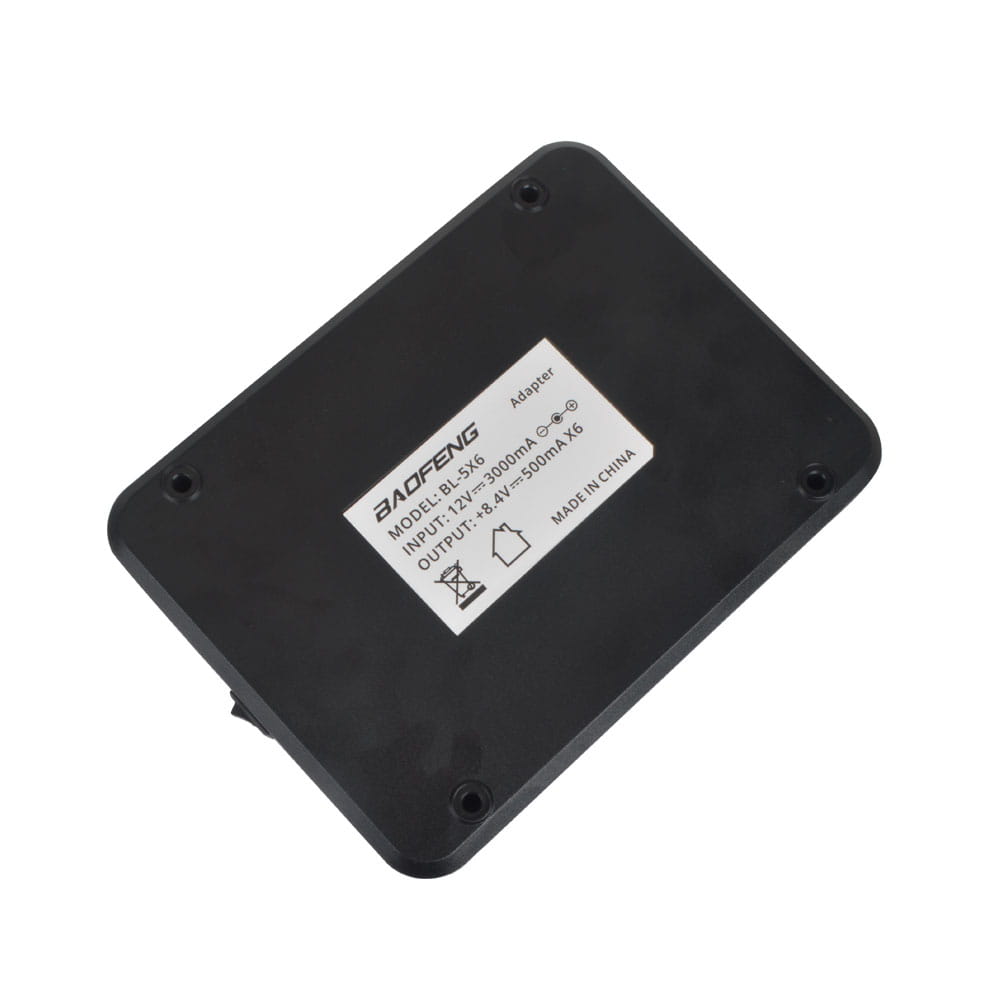 black plastic bl-5x6 six way rapid walkie talkie charger for uv-5r with white label displaying model and specifications on the back side.