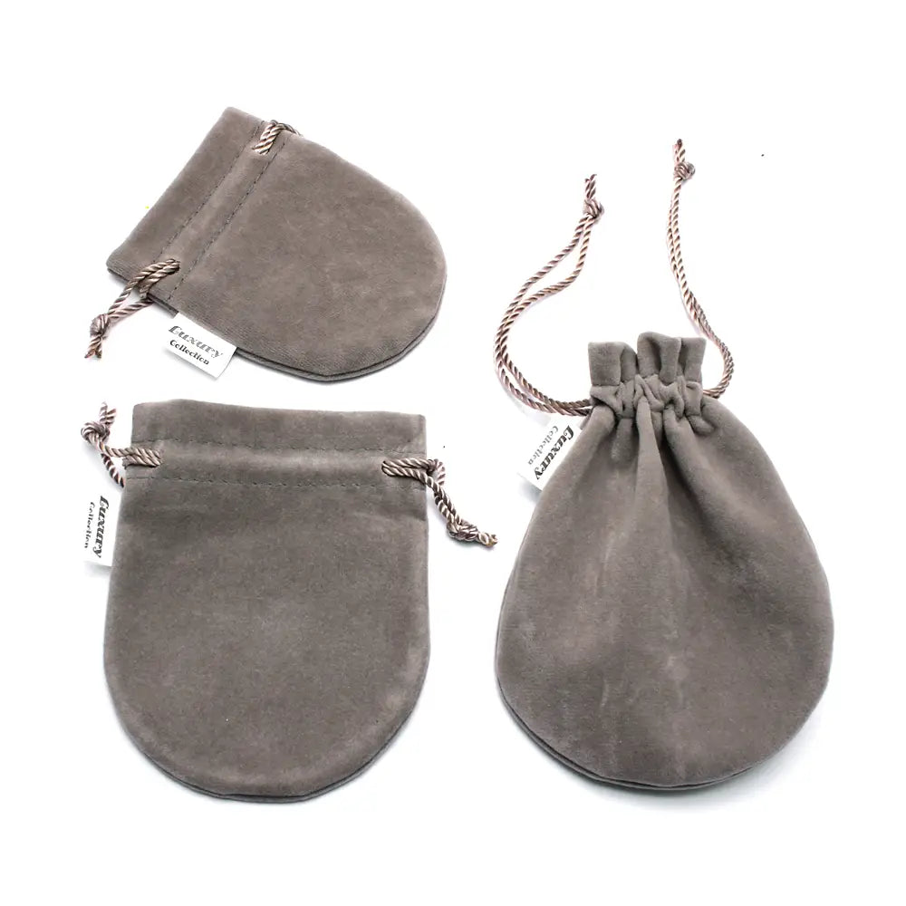 gray suede drawstring pouches with braided rope ties and small white tags for sterling silver black cz tennis bracelet 3mm packaging
