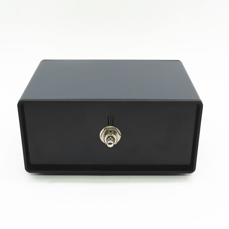 Black rectangular hifi audio switcher 2 way speaker selector box with a silver keyhole and metallic latch designed for secure audio equipment management.