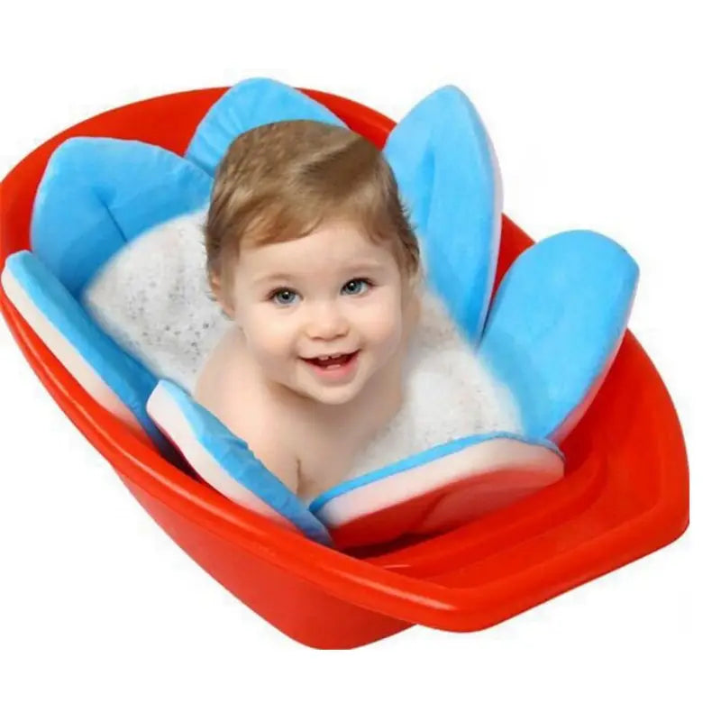 Blue and red inflatable flower-shaped baby bath seat with soft padding featured in a foldable newborn bath mat and cushion for infant comfort and safety.
