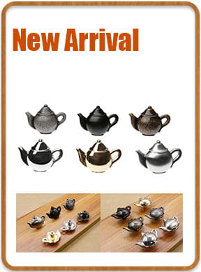 miniature teapots in black silver and gold with glossy ceramic bodies displayed alongside a zinc alloy bronze floral corner protector 4-pack for edge coverage.